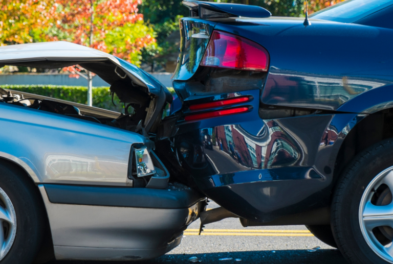 Image is of a rear-end collision, concept of determining fault in a rear-end collision