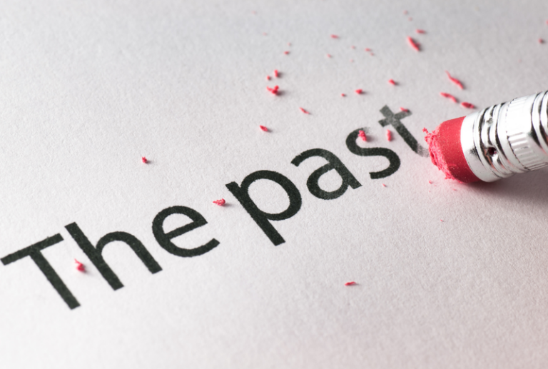 Image is of the words 'the past' being erased by a pencil eraser, concept of DUI expungement in South Carolina