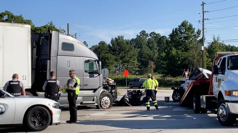 Police officers responding to truck accident in Aiken