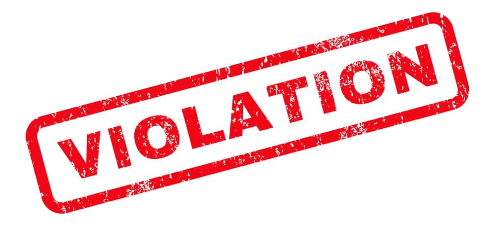 Image is of a red violation stamp, representing penalties and legal risks after breaching a protective order