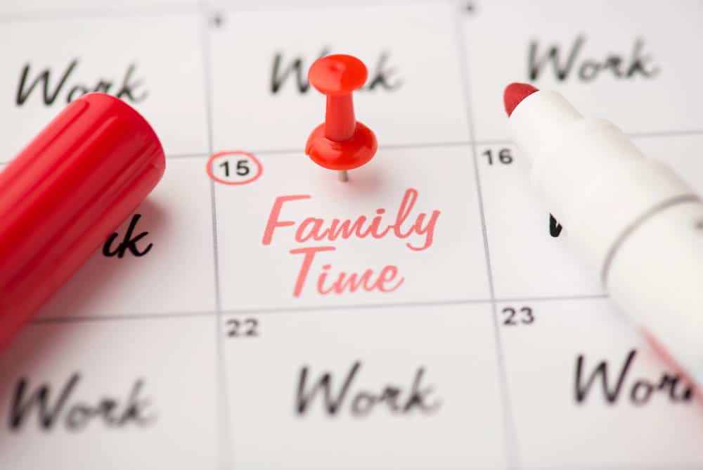Image is of a calendar highlighting family time, concept of parenting schedules developed with a child custody lawyer in Aiken.