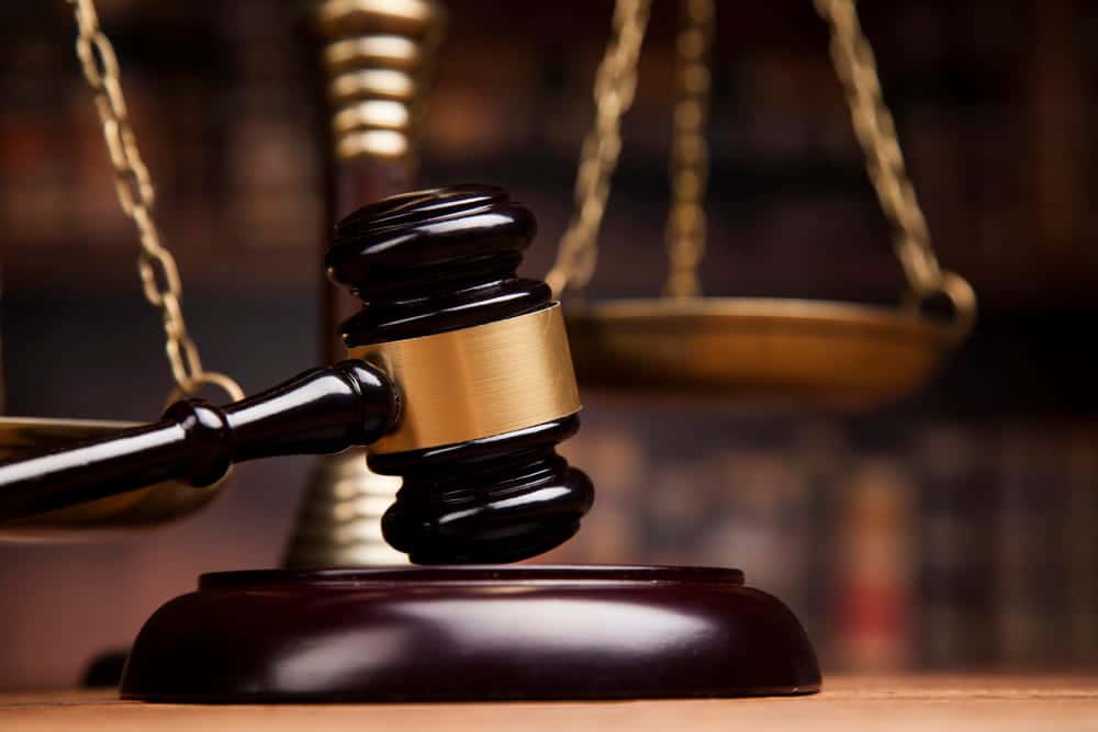 Image is of a courtroom gavel and scales of justice, concept of an Aiken drunk driving accident lawyer representing clients in legal matters involving impaired driving collisions.