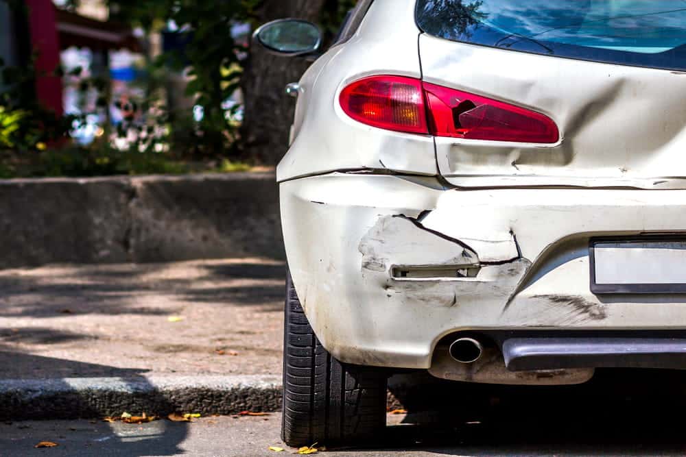 Image is of a vehicle with rear-end collision damage, concept of a hit and run accident lawyer helping Aiken victims recover compensation after a driver flees.