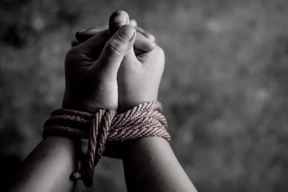 Image is of bound hands, concept of an Aiken kidnapping lawyer representing individuals accused of unlawful restraint or confinement.