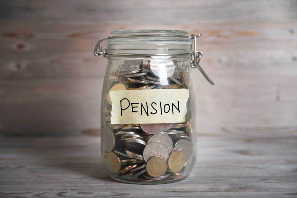 Image is of a savings jar labeled pension, concept of retirement benefit matters discussed with a military divorce lawyer in Aiken.