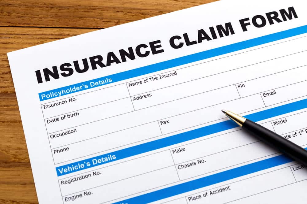 Image is of an insurance claim form used to document losses and seek compensation after an injury, concept of a personal injury lawyer.